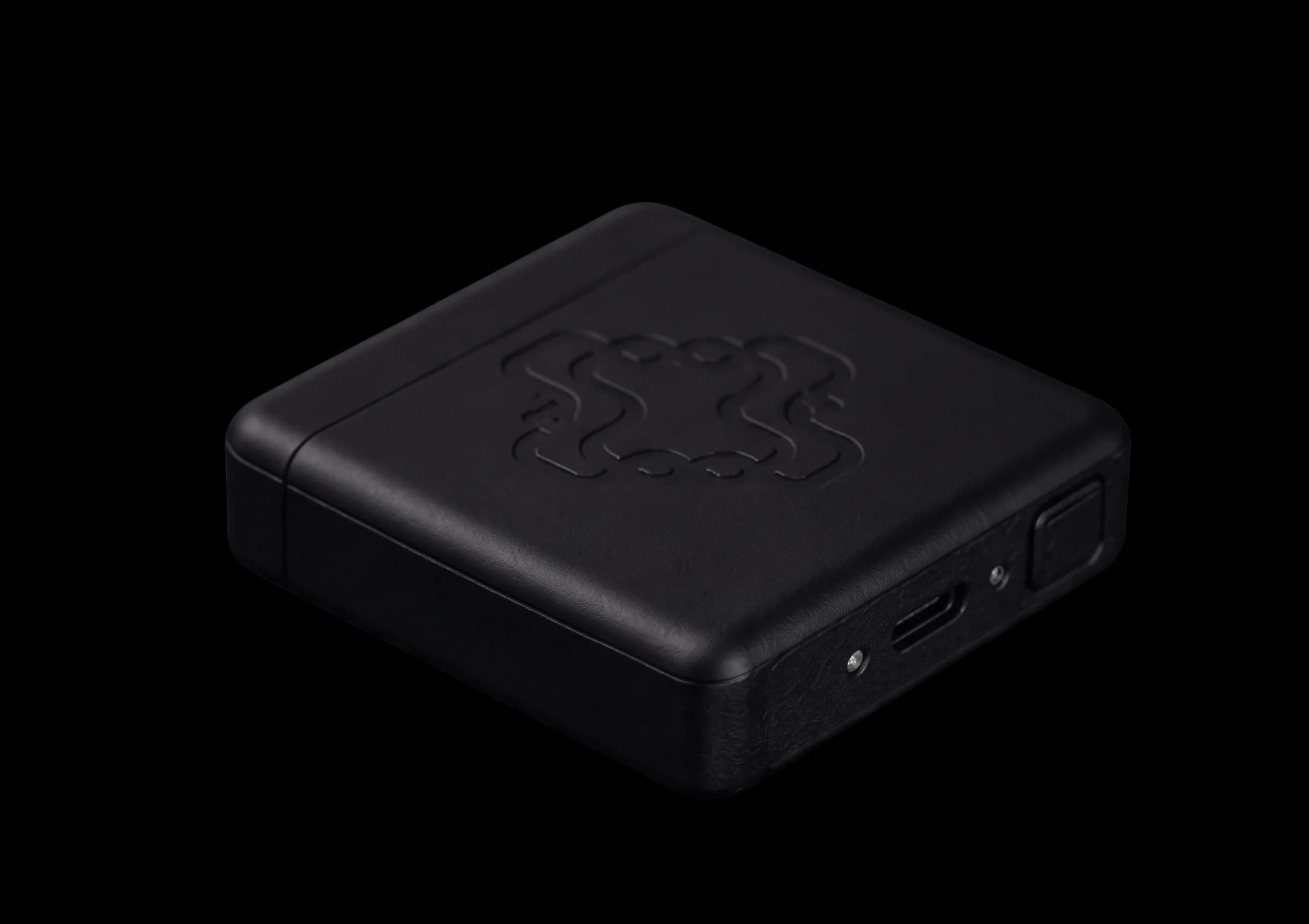 Juxta Asset Tag — ruggedized black GPS tracker with USB-C charging