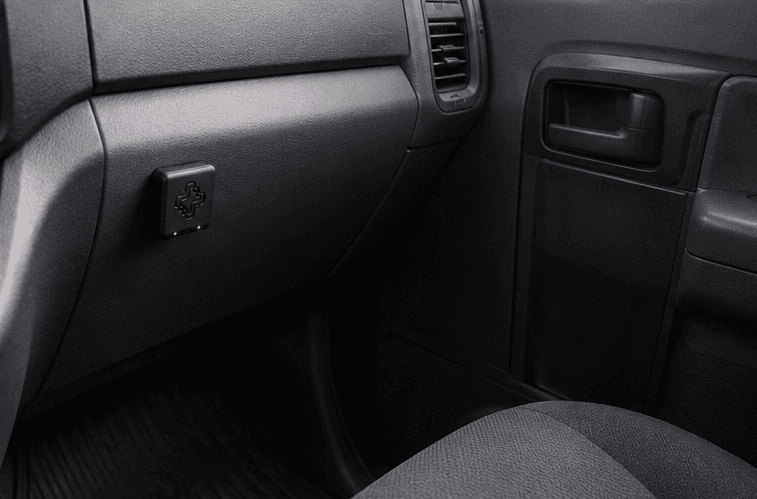Juxta Asset Tag resting in a vehicle interior