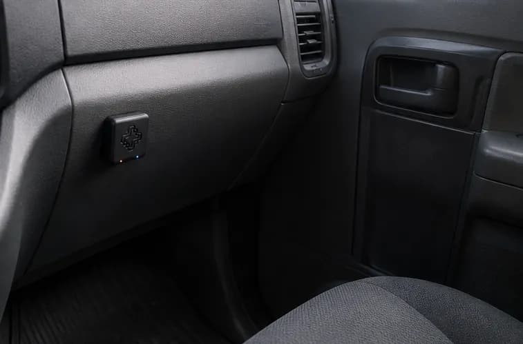 Juxta Asset Tag resting in a vehicle interior